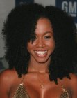 Long African hair with small curls - Natasha Budhi