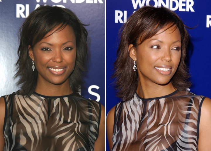 Aisha Tyler's medium long wispy hairstyle