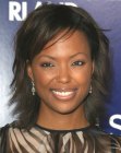 Aisha Tyler's medium long wispy hairdo