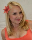 Alana Curry wearing a flower in her long blonde hair