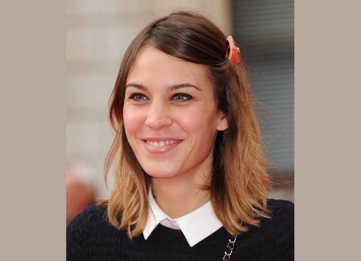 Alexa Chung's medium long hairstyle with hair that rests around the ...