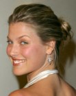 Ali Larter with her hair wrapped into a loose bun