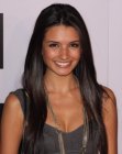 Alice Greczyn with very long shiny hair featuring an angled parting