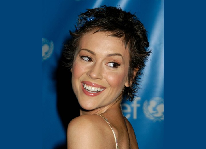 Alyssa Milano - Short and slightly over the ears hairstyle. 