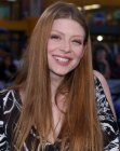 Amber Benson's very long hairstyle with slightly angled sides