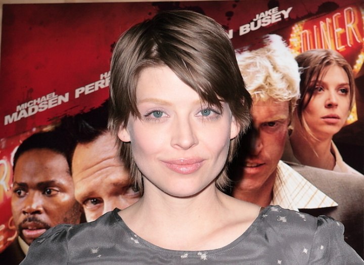 Amber Benson with short hair and exposed ear lobes