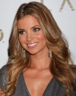 Amber Lancaster with the sides of her long hair curled away from her face