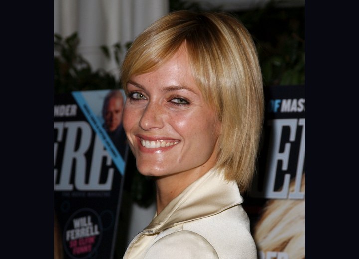 Amber Valletta with a short back angled hairstyle