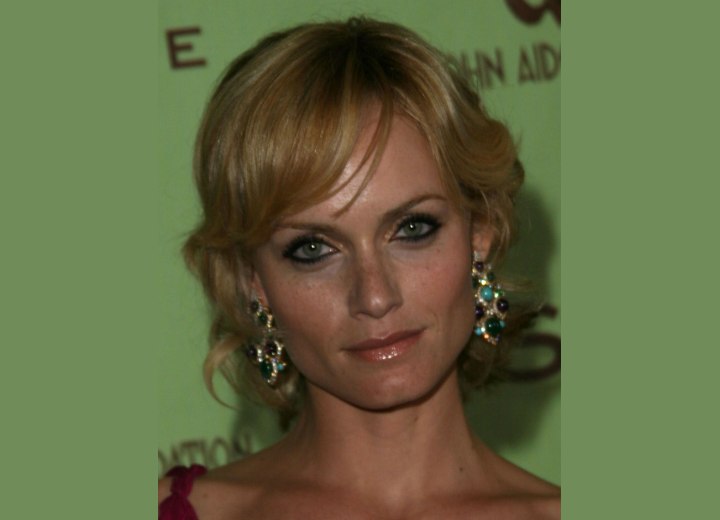 Amber Valletta with curls