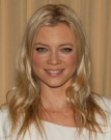 Amy Smart with long hair parted in the middle