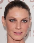 Angela Lindvall with her hair pulled back sleekly into a wet look