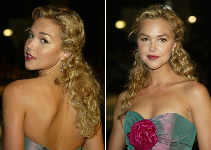 Back view of Arielle Kebbel's long curled hairstyle