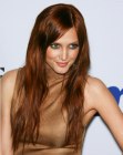 Ashlee Simpson sporting long mahogany hair with copper highlights