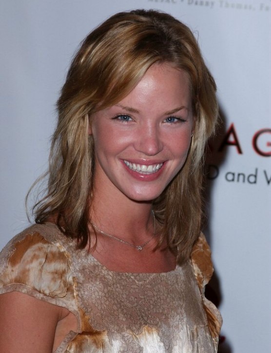 Ashley Scott wearing a long easy maintenance hairstyle