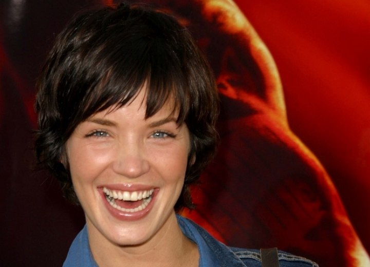 Ashley Scott with short hair covering her ears