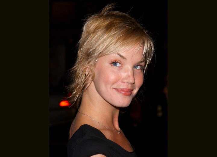 Ashley Scott with a short shag haircut