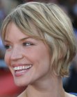 Ashley Scott's chin length short and low maintenance hairstyle