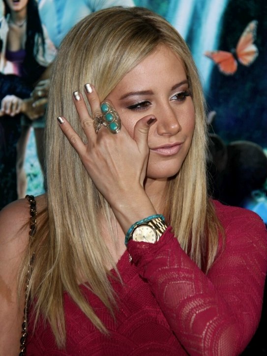 Ashley Tisdale with her hair straight and in a long razor cut