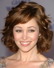 Autumn Reeser sporting a medium length hairdo with lots of bounce
