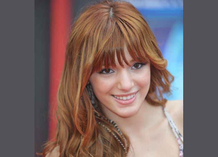 Bella Thorne - Long curled reddish hair