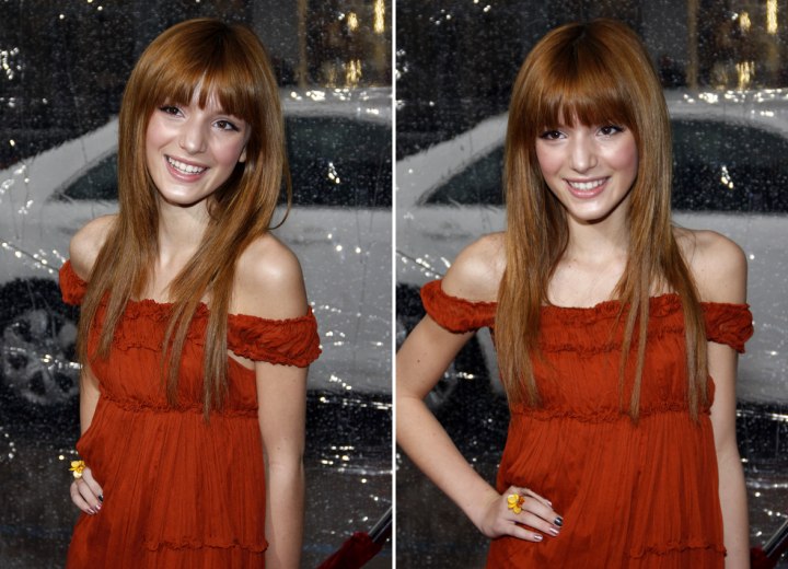 Bella Thorne wearing a red orange dress