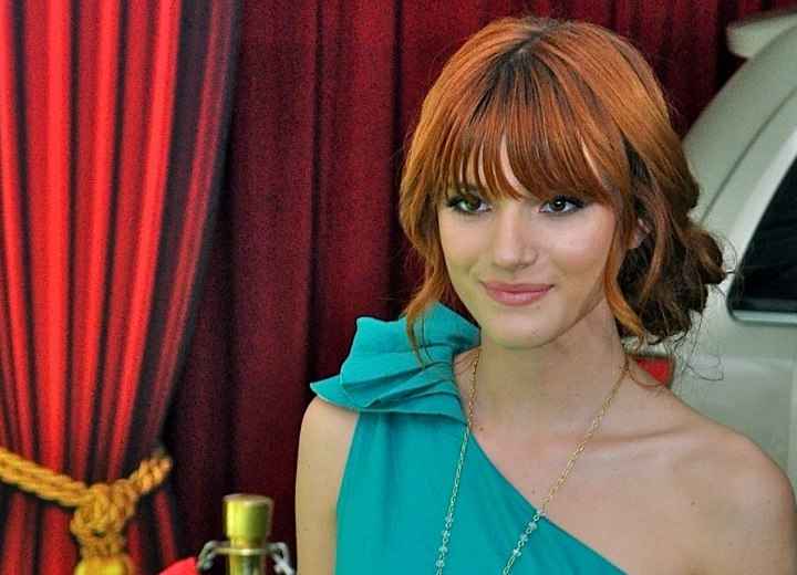 Bella Thorne - Smooth updo with bangs