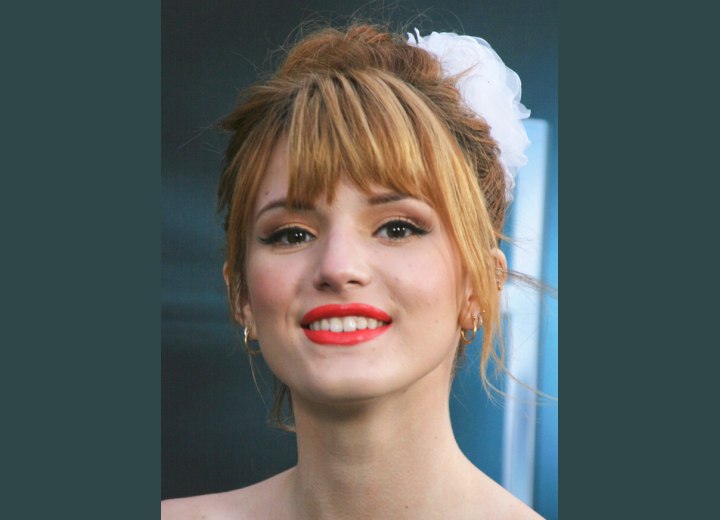 Bella Thorne - Simple up swept hairstyle with a bun