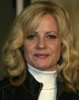 Bonnie Hunt with long wavy hair