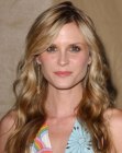 Bonnie Somerville's trendy long hairstyle with layers and curls