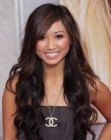 Brenda Song wearing her hair very long and curled