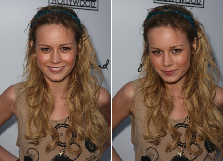 Brie Larson wearing her hair long and styled with a hairband