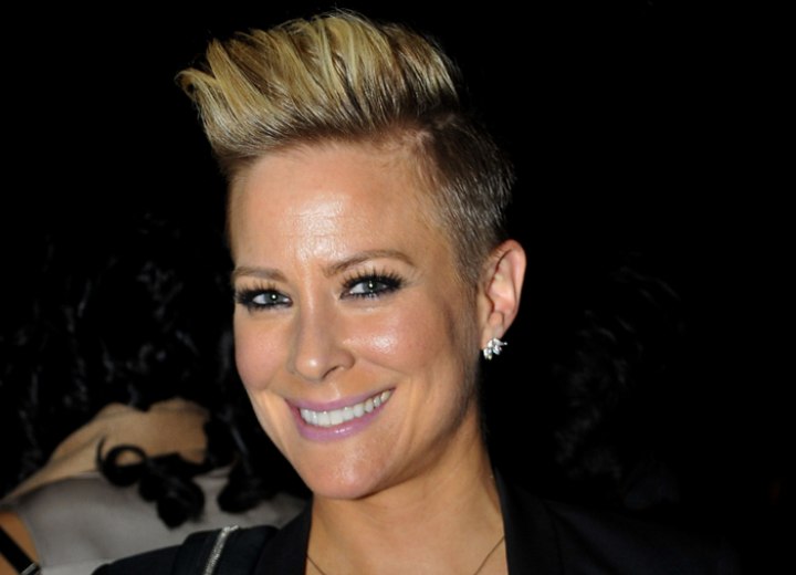 Brittany Daniel  Very short boyish haircut with the sides 