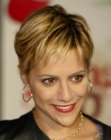 Brittany Murphy wearing her hair in a fake pixie