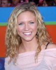Brittany Snow with free flowing long and wavy hair