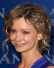 Calista Flockhart with her hair gathered and pinned up in the back