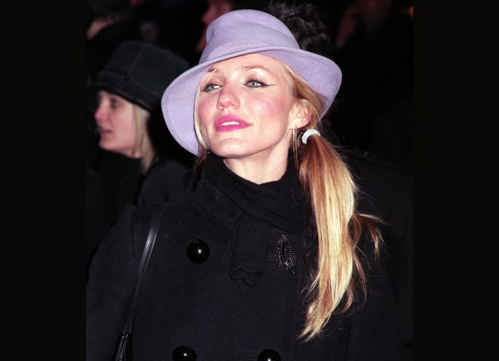 Cameron Diaz wearing a purple hat