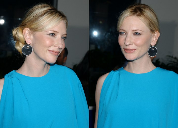 Cate Blanchett with her hair styled smoothly back in a Cate Blanchett with her hair styled smoothly back in a