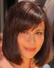 Brunette Catherine Bell's bob with an angle and more length in the front
