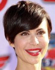 Catherine Bell wearing her hair short in a pixie cut