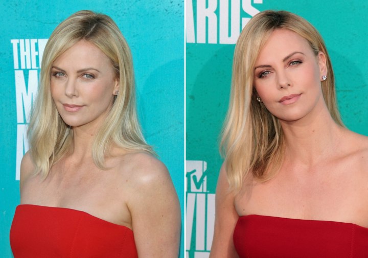 Charlize Theron's long hairstyle with a neat side partition