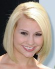 Chelsea Staub's blonde below the chin bob with a shorter neck section