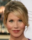 Christina Applegate's up-style with low side bangs