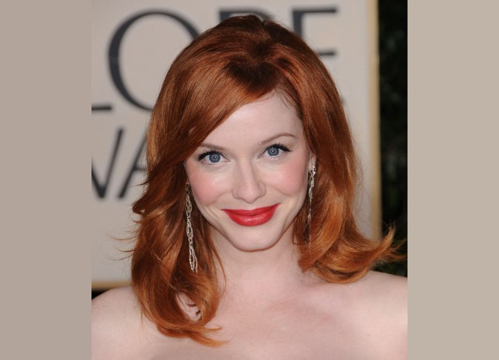 Christina Hendricks - Long red hairstyle with side bangs