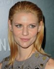 Claire Danes with her long hair in a slick backcombed style