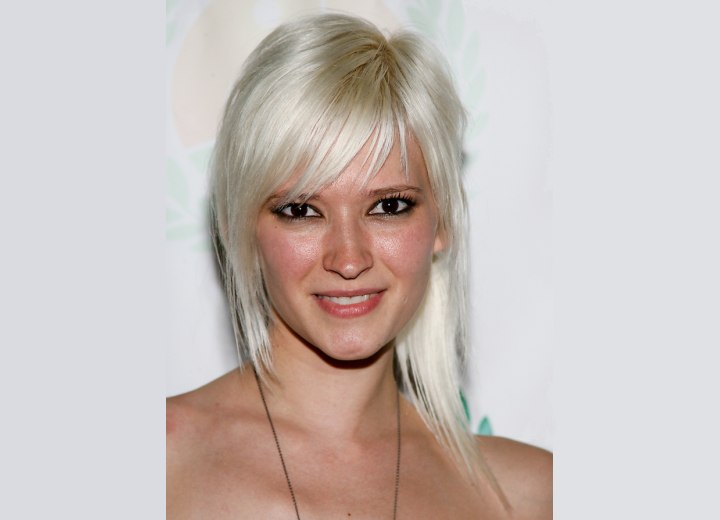 Courtney Yates - Long slithered hairstyle with a shorter side