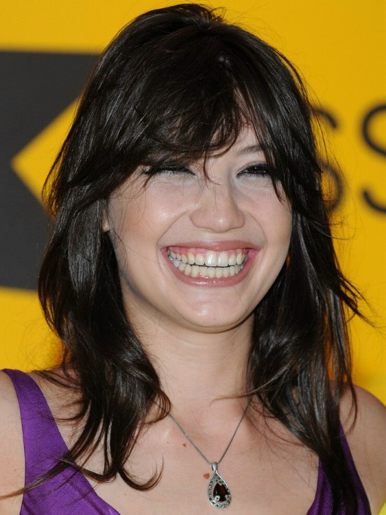 Daisy Lowe's hair cut in a long shag hairstyle