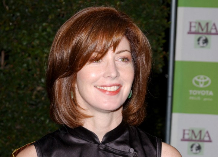 Dana Delany - Medium-long layered hairstyle