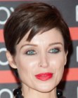 Dannii Minogue wearing her hair short in a pixie cut