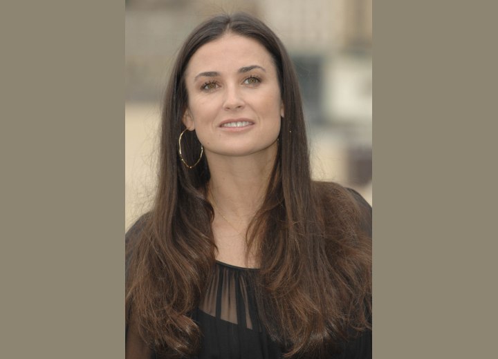 Demi Moore - Long center parted hairstyle