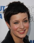 Brunette Diablo Cody with her hair chopped short into a layered pixie